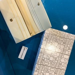 Comme des garcons ivory continental wallet